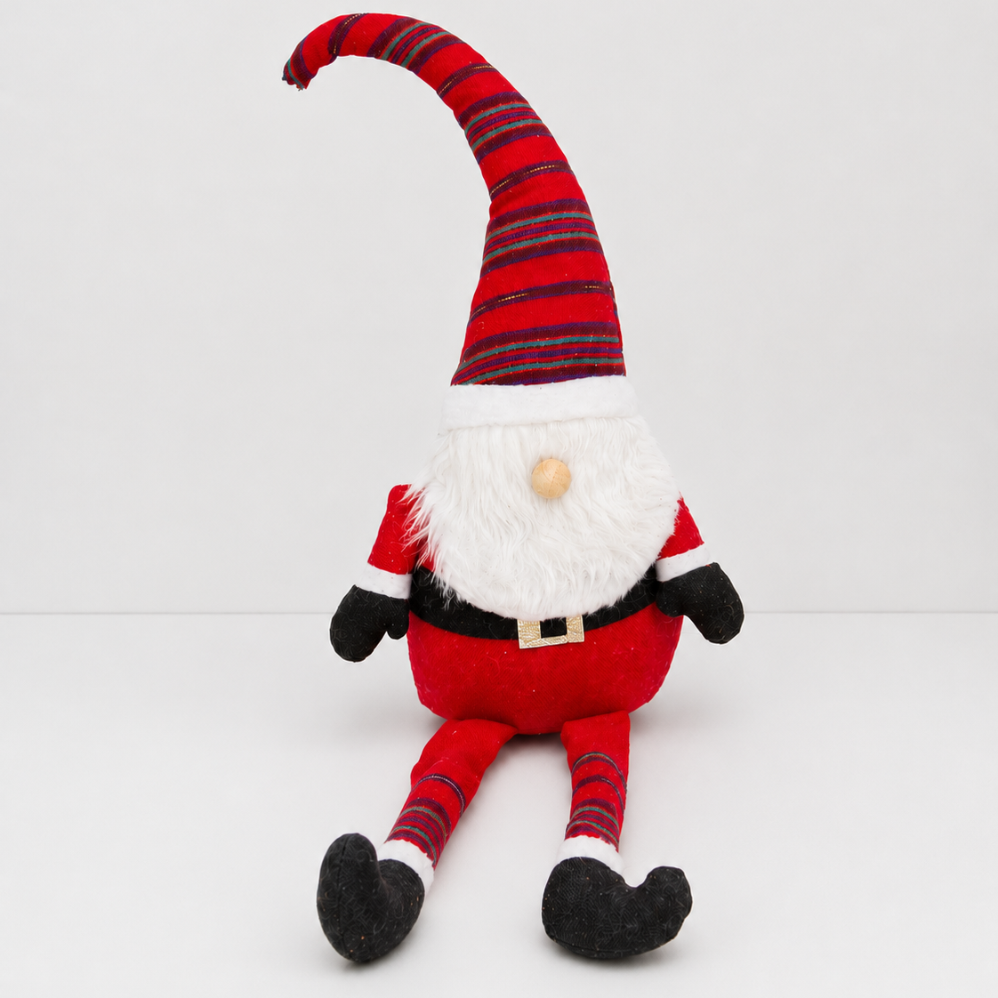Santa gnome figurine on a white background