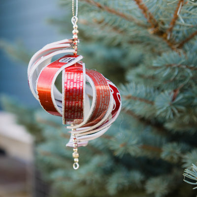 Recycled Soda Can Spiral Ornament Hanging on Tree